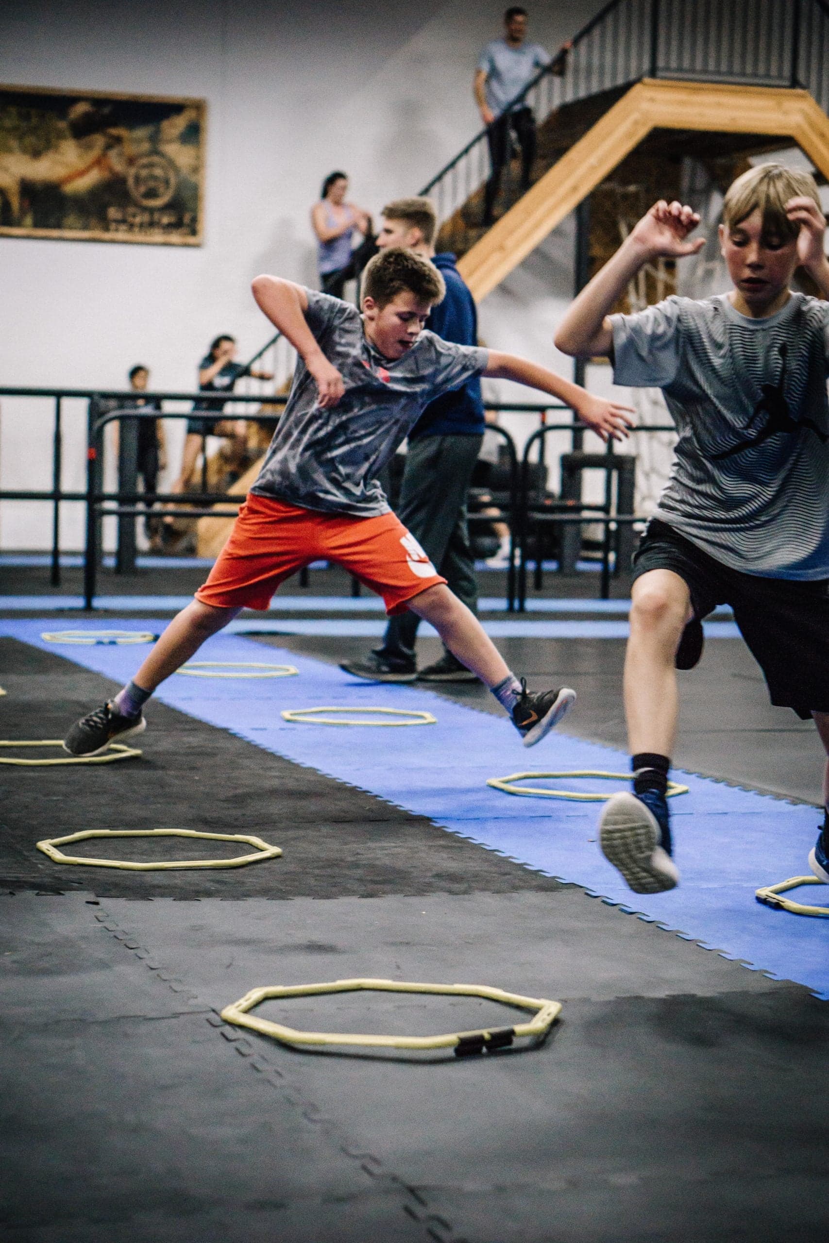 Youth athletes performing agility ring drills at ADAPT: sport-specific training, middle school through college